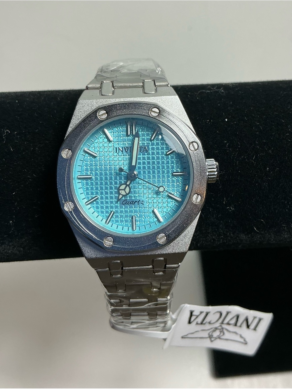 Invicta woman’s Silver Watch with Turquoise Dial(69262)